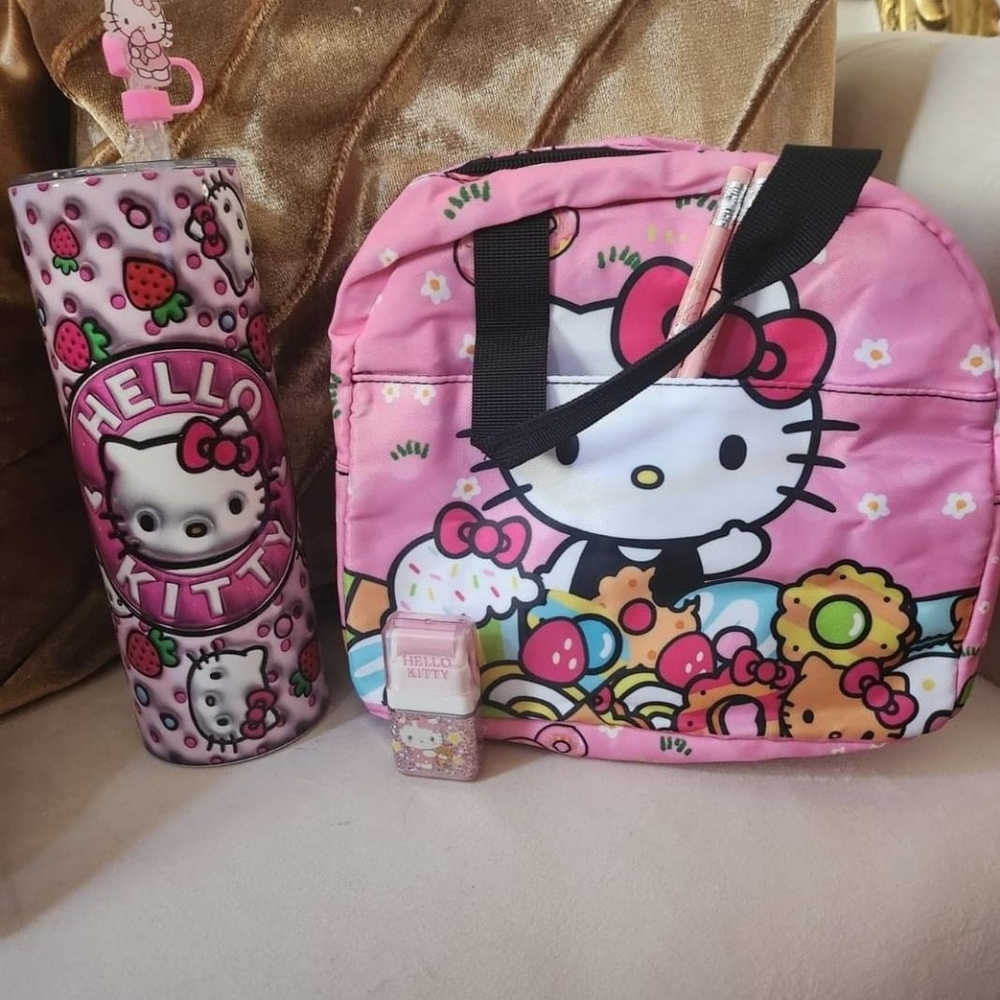 Hello Kitty lunch bag and strawberry thermos with topper, eraser and 2 pencils